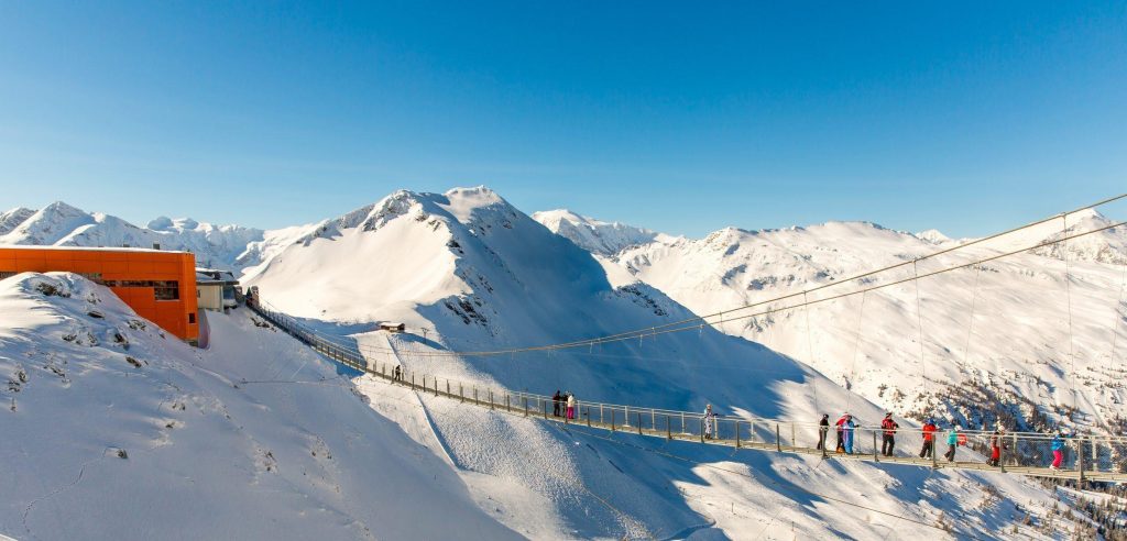 Cableway and chairlift in ski resort Bad Gastein in mountains